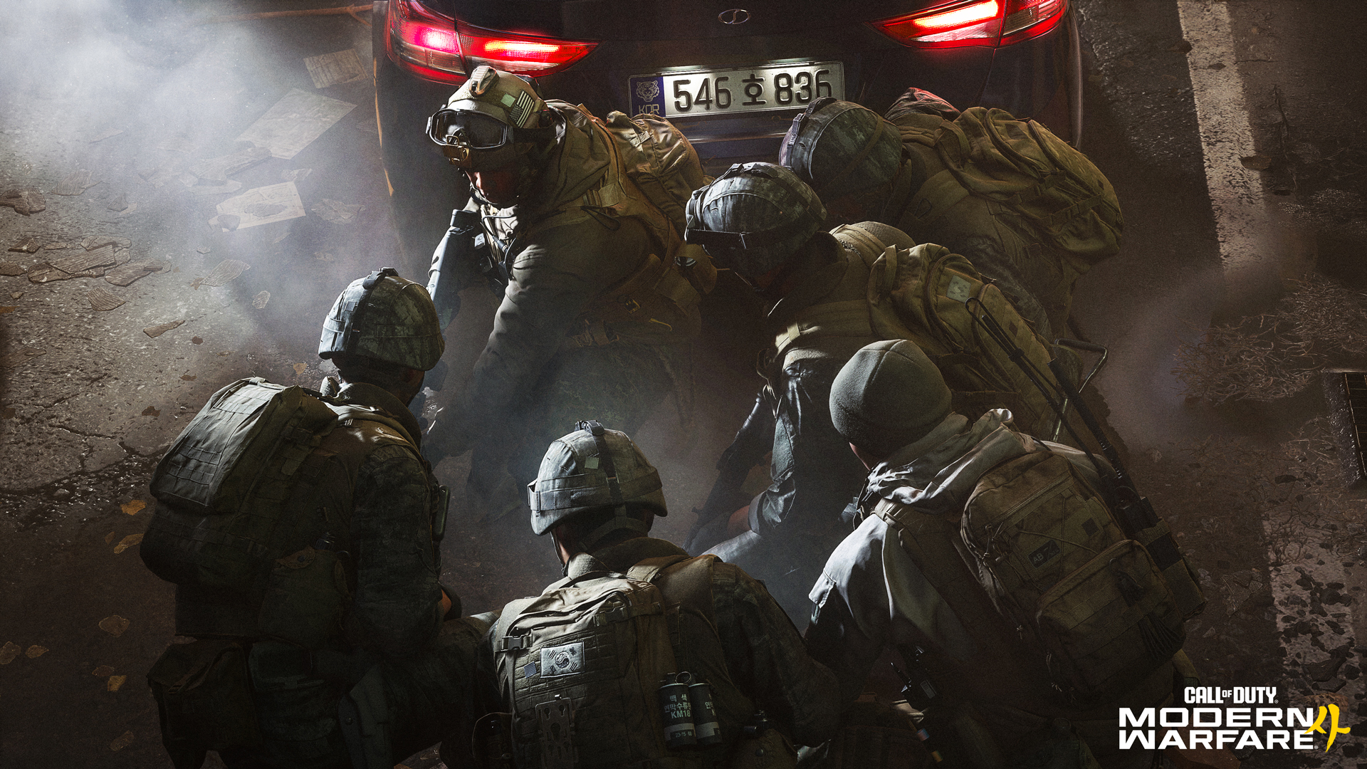 South Korean soldiers move through a smoke filled street in the Modern Warfare 4 campaign, which opens with a North Korean invasion of the South.