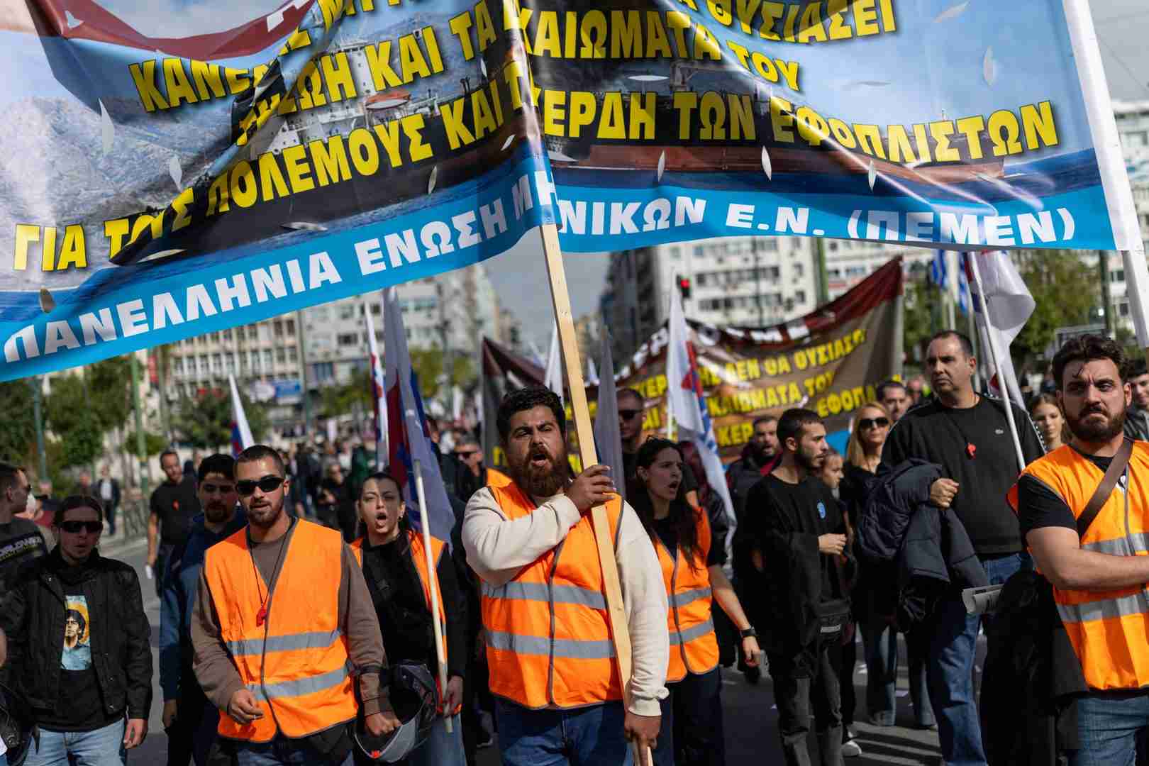 Dockworkers and seafarers rally at the port of Piraeus, Greece, during the 24 hour strike on October 30, 2026. About 3,000 workers joined the walkout at Greece's largest port and ferry services to the islands were suspended.