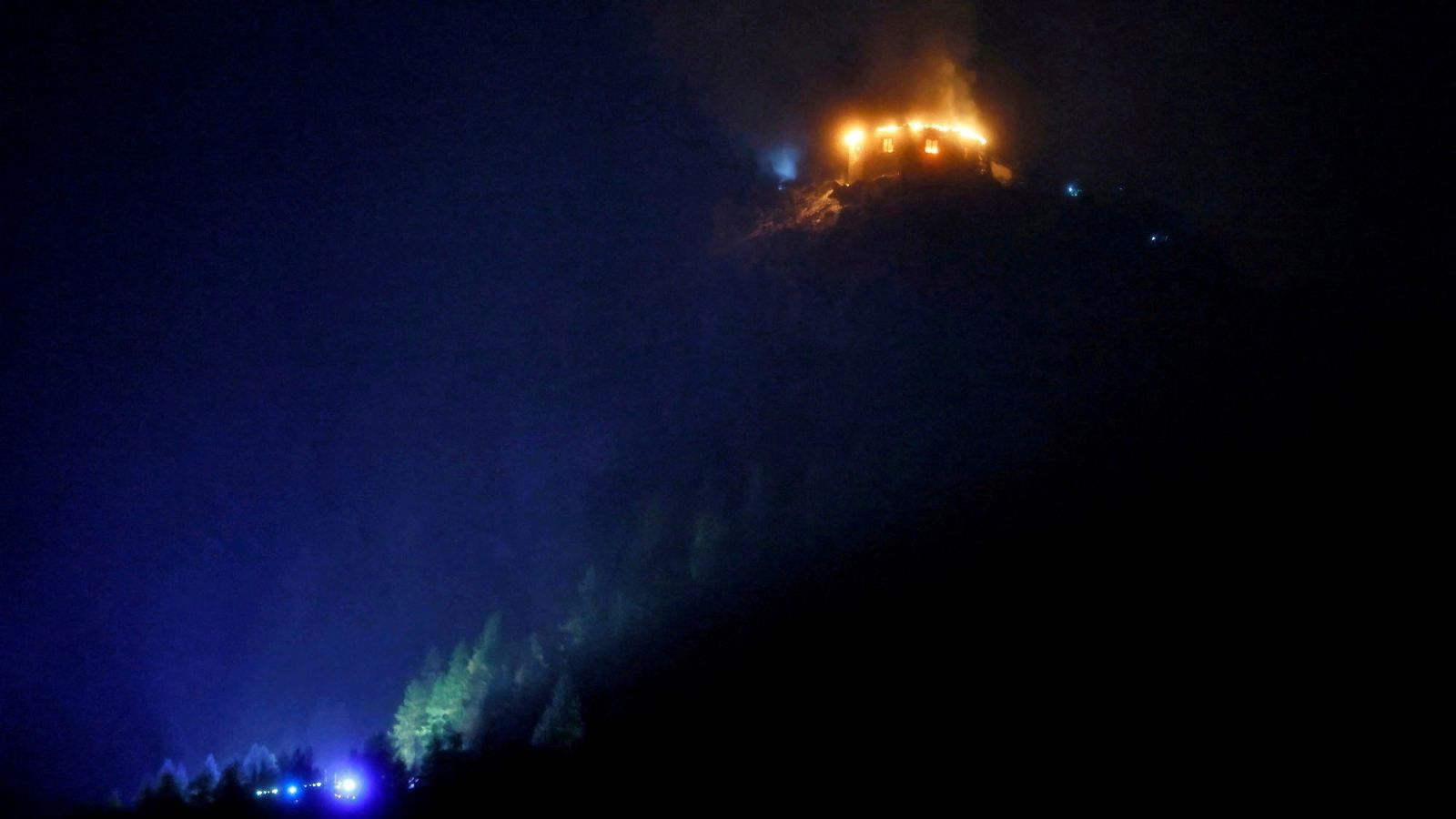 Firefighters and emergency staff at the Kehlsteinhaus above Berchtesgaden on Saturday, after fire swept through the building on Friday night.