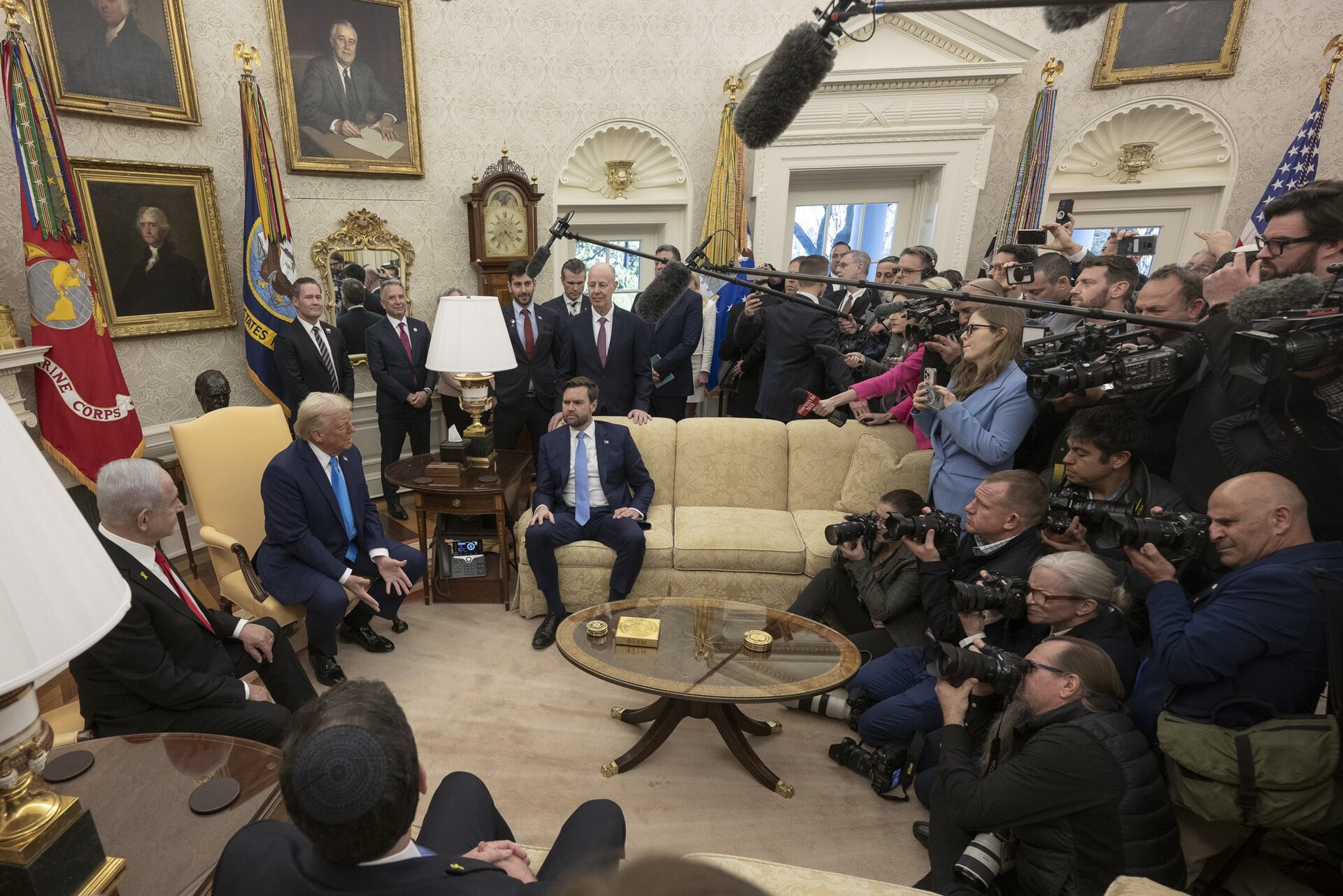 Benjamin Netanyahu, left, with Donald Trump in the Oval Office in February 2025, and Vice President JD Vance on the couch. Netanyahu closed his campaign on the alliance, telling voters on Sunday that Trump would act again on Iran only if he stayed in power. File photo.