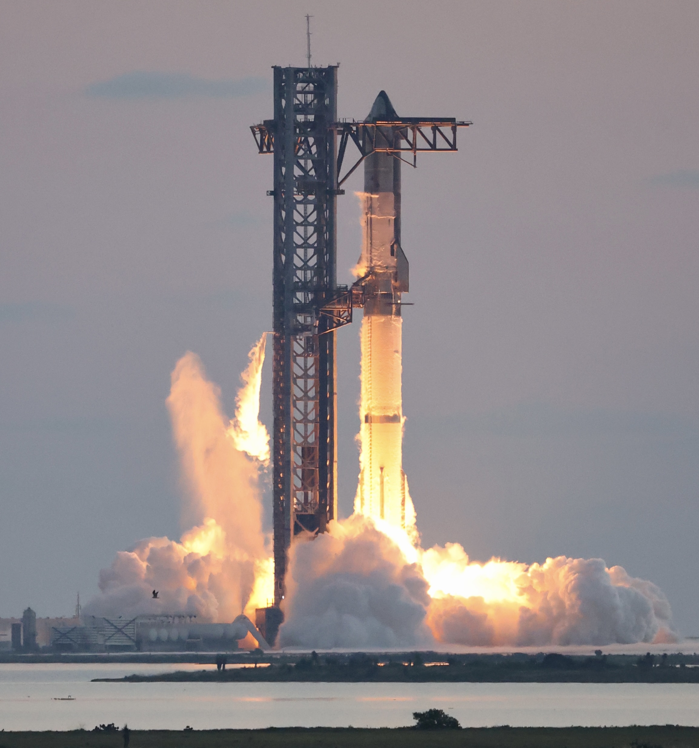 A SpaceX Starship ignition during the IFT-5 flight test at Starbase, Texas. SpaceX and Tesla have formed special committees to discuss a merger. File photo.