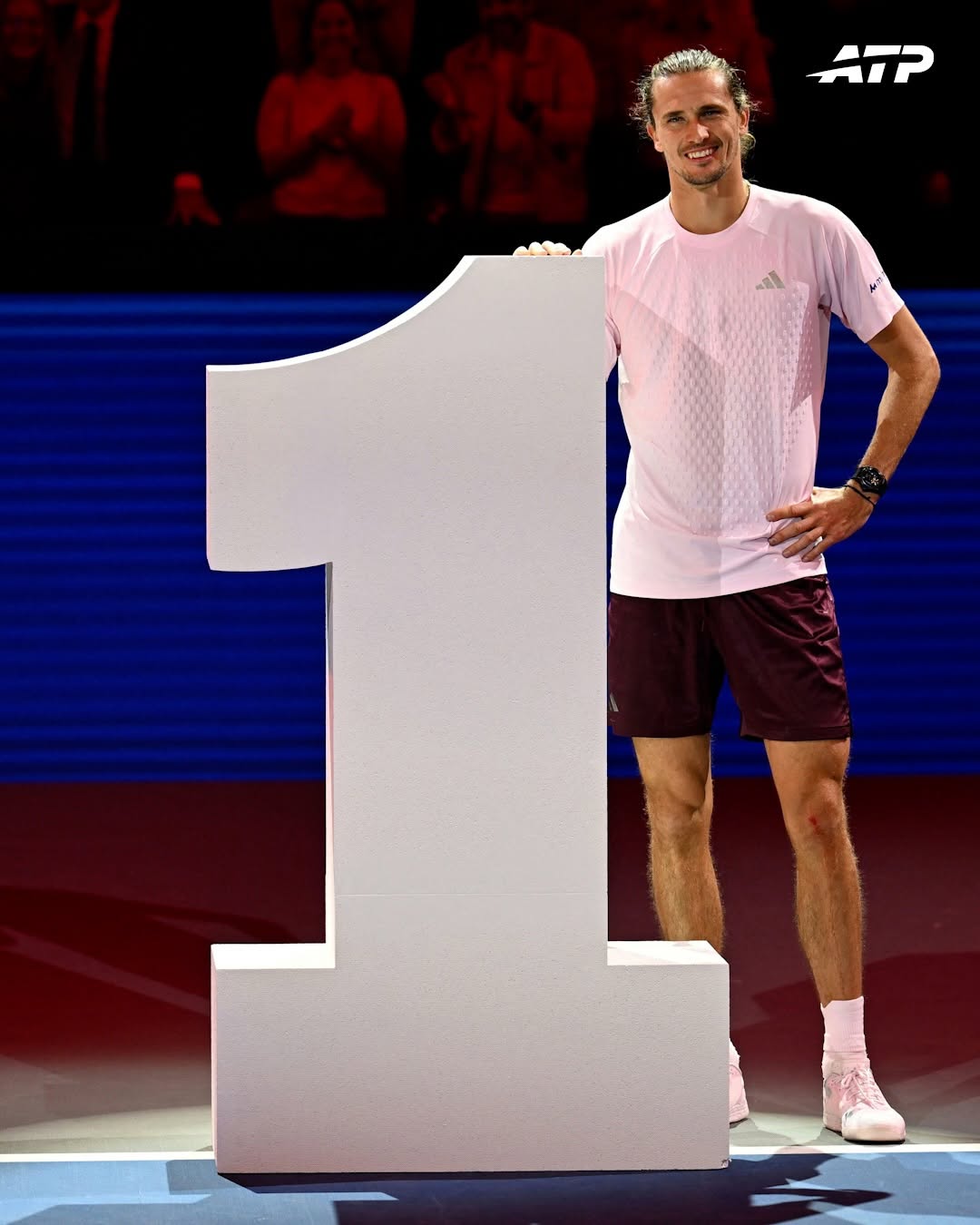 Alexander Zverev poses with the number one sculpture on court in Vienna after his win over Tallon Griekspoor sealed the top ranking. Thomas Muster, the only Austrian to hold the ranking, joined the ceremony.